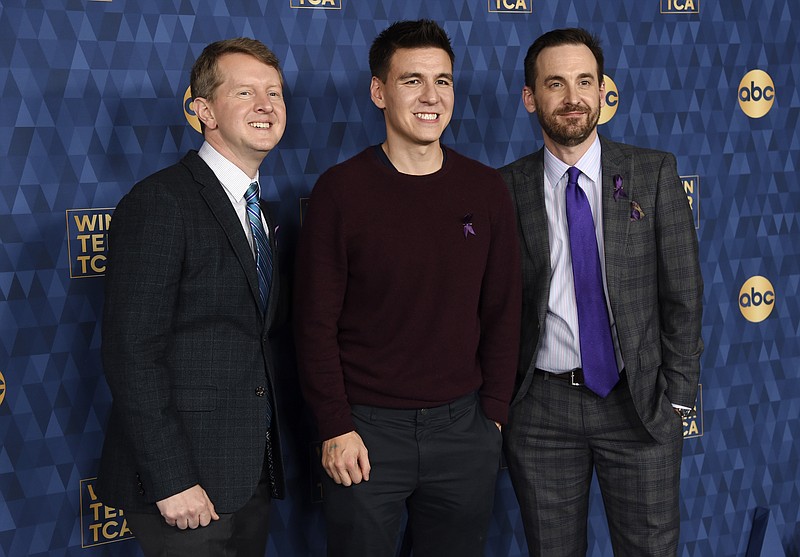 Ken Jennings, left, James Holzhauer, center, and Brad Rutter, cast members in the ABC television series "Jeopardy! The Greatest of All Time," pose together at the 2020 ABC Television Critics Association Winter Press Tour, Wednesday, Jan. 8, 2020, in Pasadena, Calif. (AP Photo/Chris Pizzello)


