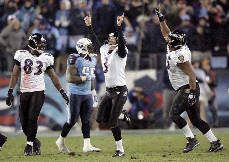 In this Jan. 10, 2009, file photo, Baltimore Ravens' Matt Stover (3) celebrates as Tennessee Titans linebacker Stephen Tulloch (55) walks away after Stover kicked a 43-yard field goal with 53 seconds left in the fourth quarter to give the Ravens a 13-10 win in an NFL football divisional playoff game in Nashville, Tenn. At left is Ravens tight end Daniel Wilcox (83) and at right is center Chris Chester. The Titans playing the Ravens in the divisional round on Saturday night, Jan. 11, has revived strong memories of a very intense and bitter playoff rivalry along with the agony of possible Super Bowl titles lost. (AP Photo/Wade Payne, File)