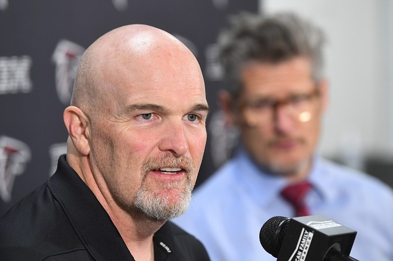 Atlanta Falcons coach Dan Quinn, left, and general manager Thomas Dimitroff face the media during a news conference held by the NFL football team, Monday, Dec. 30, 2019, in Flowery Branch, Ga. Quinn and Dimitroff were in the hot seat earlier this season after a poor start, but owner Arthur Blank made the decision to retain both of them last week. (John Amis/Atlanta Journal-Constitution via AP)


