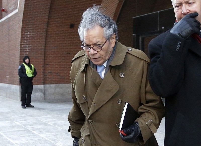 FILE - In this Jan. 30, 2019, file photo, Insys Therapeutics founder John Kapoor leaves federal court in Boston. Kapoor and former top employees of the pharmaceutical company are facing a reckoning for their role in a bribery scheme that prosecutors say boosted sales of a powerful, highly addictive painkiller and helped fuel the national opioid epidemic.Starting Monday, Jan. 13, 2020, seven people who worked for Insys Therapeutics will appear in Boston to be sentenced by a federal judge. (AP Photo/Steven Senne, File)