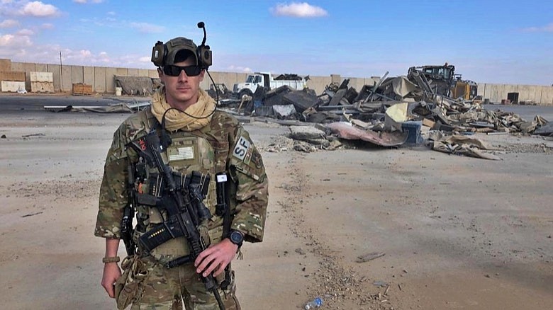 A U.S. soldier stands while bulldozers clear rubble and debris at Ain al-Asad air base in Anbar, Iraq, Monday, Jan. 13, 2020. Ain al-Asad air base was struck by a barrage of Iranian missiles on Wednesday, in retaliation for the U.S. drone strike that killed atop Iranian commander, Gen. Qassem Soleimani, whose killing raised fears of a wider war in the Middle East. (AP Photo/Ali Abdul Hassan)