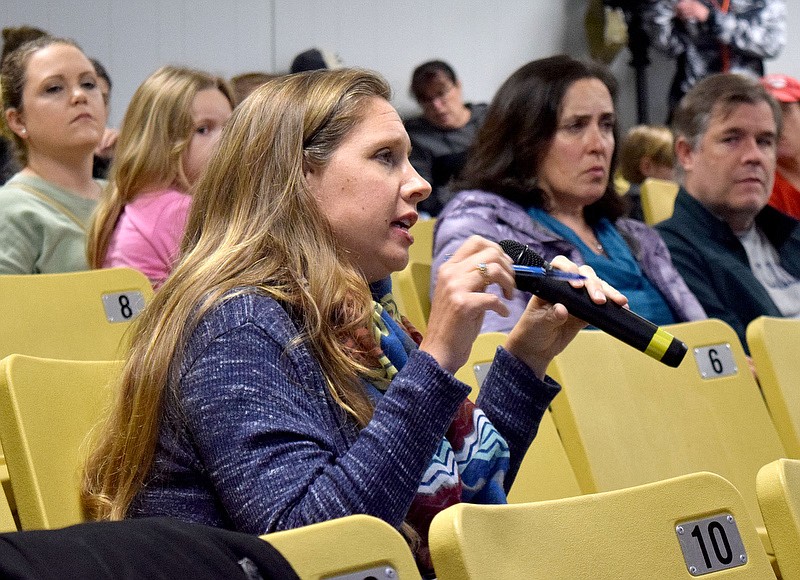 Staff Photo by Robin Rudd/ Concerned parent Erica Kramer asks a question.  The conversation about rezoning some of Hamilton County Schools’ attendance zones began with a meeting to discuss the East Hamilton/Ooltewah rezoning at Ooltewah Middle School Tuesday night. This is the first of three such meetings.