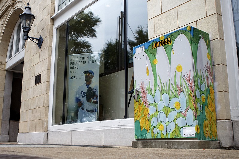 Staff file photo by C.B. Schmelter / Center for Creative Arts student Maya Varner's "Untitled" design is seen on the utility box at Seventh and Broad streets in downtown Chattanooga. Local students came up with the designs for streetside utility boxes for EPB's ArtSpark Goes to School challenge. While creating their artwork, the students learned about electricity, furthering ArtSpark's focus on STEAM projects (science, technology, engineering, art and math).