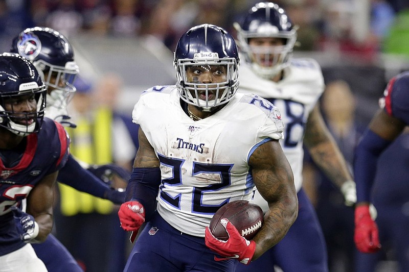 FILE - In this Dec. 29, 2019, file photo, Tennessee Titans running back Derrick Henry (22) breaks away for a 53-yard touchdown run during the second half of an NFL football game, in Houston. The top-seeded Baltimore Ravens (14-2) bring a 12-game winning streak and the most productive offense in the NFL into Saturday's AFC playoff game against the Titans (10-7), who advanced by beating New England 20-13 last week. (AP Photo/Michael Wyke, File)