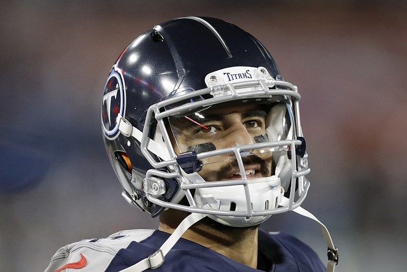 Tennessee Titans quarterback Marcus Mariota looks at the scoreboard in the second half of a home game against the Jacksonville Jaguars on Nov. 24. Mariota was benched for Ryan Tannehill in mid-October after a 2-4 start, but the former starter has continued to help by serving as the scout team quarterback and has even played in each of Tennessee's past three games, all wins. / AP photo by James Kenney


