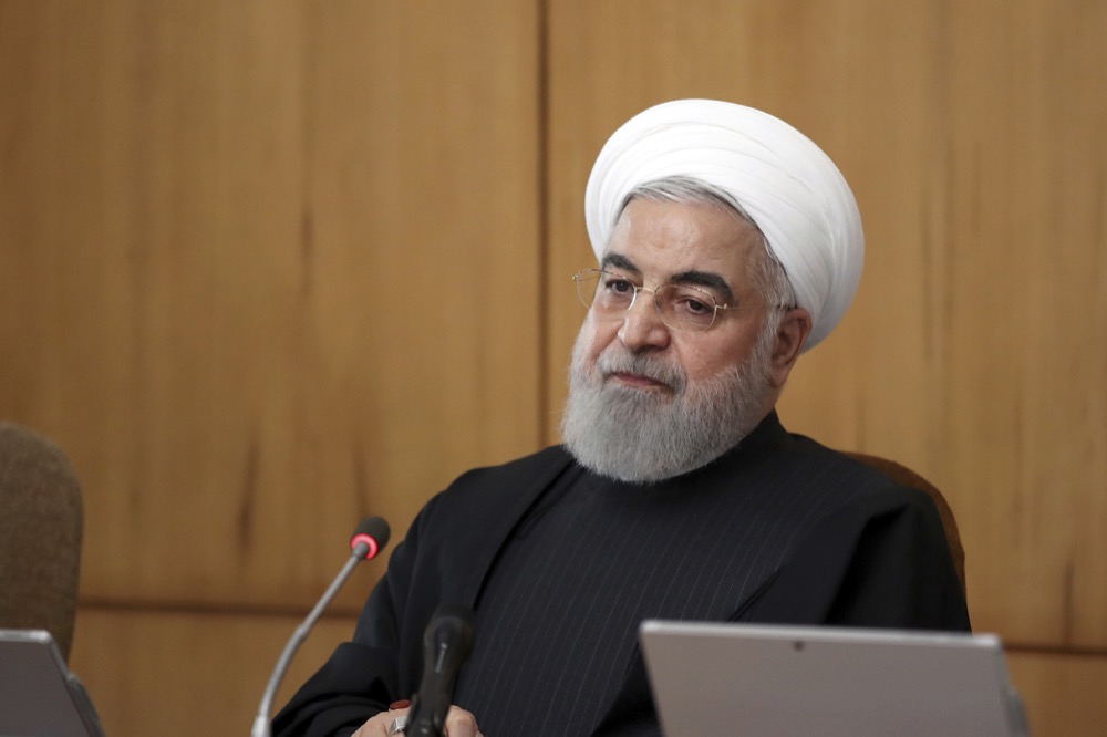 In this photo released by the official website of the Office of the Iranian Presidency, President Hassan Rouhani speaks in a cabinet meeting in Tehran, Iran, Wednesday, Jan. 15, 2020. Iran's president is warning that European soldiers deployed in the Mideast