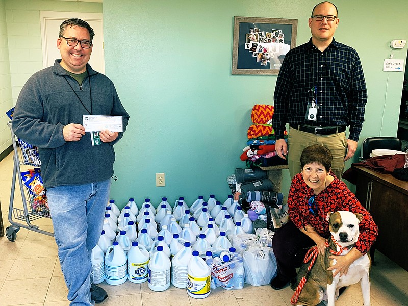 Contributed photo by Ryan Bandy / From left, Dr. Darren Crutcher, Dr. Ryan Bandy and Sandy Weathers from Ridgeland Honors Academy donate 40 blankets, 80 bottles of bleach, 40 dog toys, 40 cats toys, 100 bags of treats and a $1,000 grant for dog food and other needed supplies to the Walker County Animal Shelter.