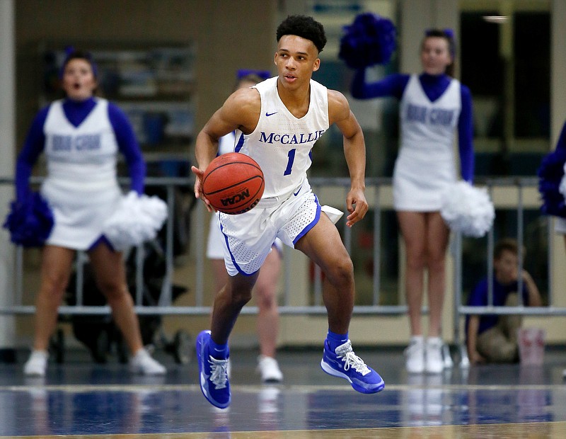 McCallie's Eric Rivers takes the ball down the floor during Friday night's home win against Chattanooga Christian. / Staff photo by C.B. Schmelter