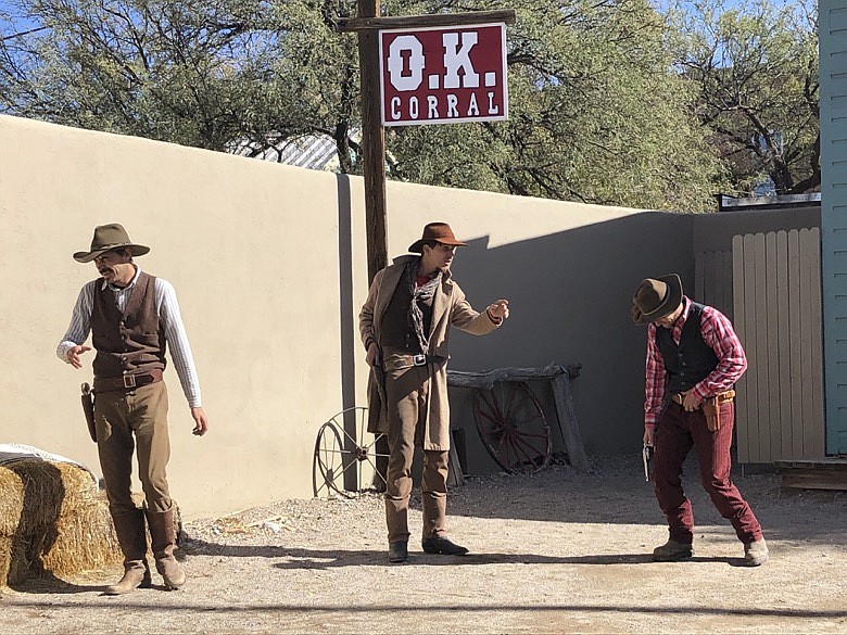 Actors are seen reenacting the events that led to an 1881 shootout in the town that left three dead and became one of the most famous gun battles in the Old West on Saturday, Nov. 20, 2019 in Tombstone, Ariz. Numerous books and movies have been based on the shootout. Tombstone was founded and flourished in the late 19th century after large amounts of silver were found in the area. (AP Photo/Peter Prengaman)