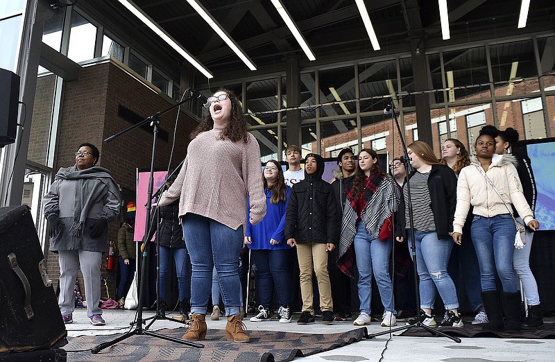 Staff Photo by Robin Rudd/   Shea Grande, front, is backed by the rest of the Wake Up Youth Jazz Esemble as she sings.  Chattanooga Women's Rally 2020 was held at Miller Park on January 18, 2020.  The event highlighted the political power and progress of women in the Chattanooga area.  