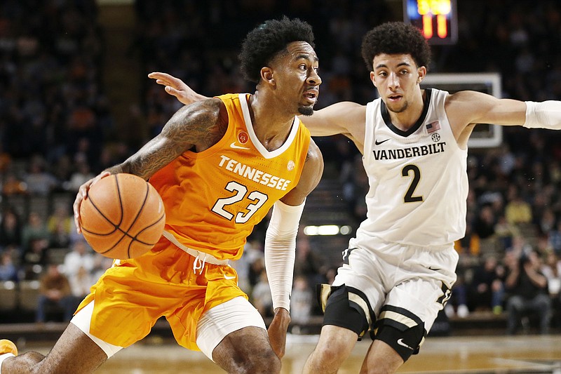 Tennessee guard Jordan Bowden drives past Vanderbilt guard Scotty Pippen Jr. during the second half of Saturday night's SEC game in Nashville. Bowden scored 21 points as Tennessee won 66-45. / AP photo by Mark Humphrey