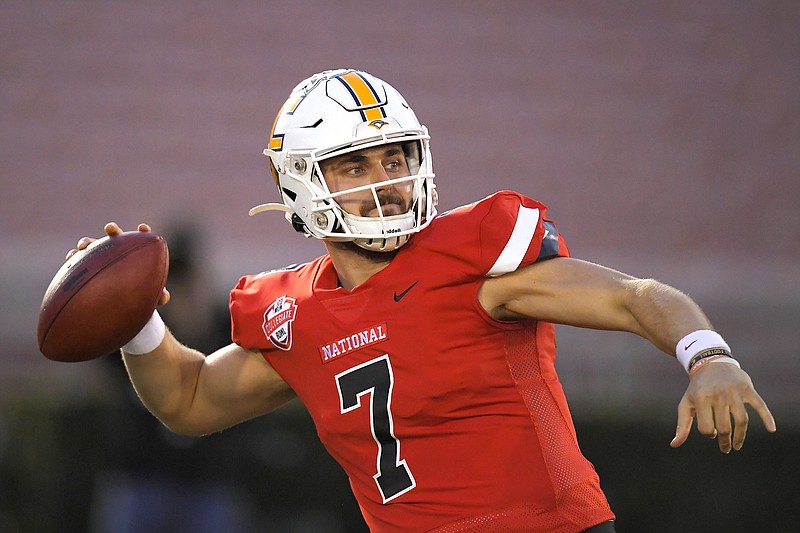 National Team quarterback Nick Tiano passes during the first half of the NFLPA Collegiate Bowl on Saturday night in Pasadena, Calif. The former Baylor School and UTC standout finished 8-of-10 for 135 yards and a touchdown to lead the National Team to a 30-20 victory and earn game MVP honors. / AP photo by Mark J. Terrill