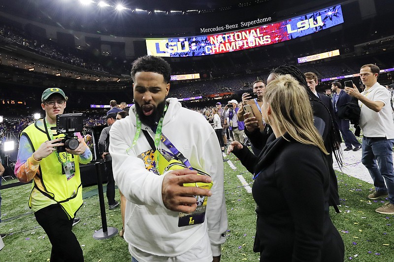 Cleveland Browns wide receiver and former LSU star Odell Beckham Jr. walks off the field at the Superdome after his alma mater beat Clemson in the College Football Playoff final Monday night. / AP photo by Gerald Herbert