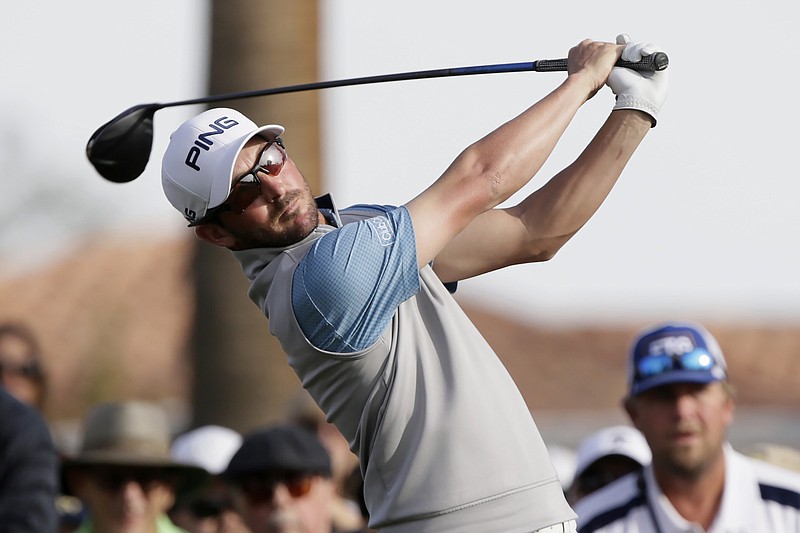 Andrew Landry follows through after teeing off on the 15th hole at PGA West's Stadium Course during the final round of The American Express tournament Sunday in La Quinta, Calif. Landry closed with a 67 to win by two strokes over Abraham Ancer. / AP photo by Alex Gallardo