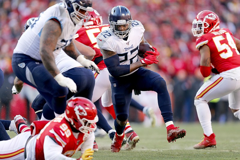 Tennessee Titans running back Derrick Henry moves through the Kansas City defense the first half of Sunday's AFC title game. The Chiefs limited Henry to 69 yards on 19 carries after he rushed for at least 182 in each of his previous three games. / AP photo by Jeff Roberson