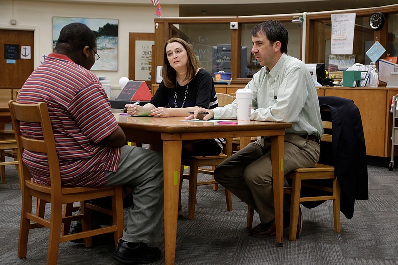 Martin Boatwright, left, talks with Justin Robertson, right, and Elaine Harper from the Hamilton County Department of Education during mock interviews at Hixson High School on Thursday, June 14, 2018, in Chattanooga, Tenn. The interviews were conducted as part of Project Search, a partnership with HCDE and area businesses like BlueCross BlueShield that prepares students with learning and intellectual disabilities for transition to adulthood.