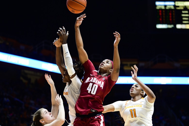 Alabama forward Jasmine Walker (40) and Tennessee guard/forward Rennia Davis (0) go for the ball during a game at Thompson-Boling Arena in Knoxville, Tenn. on Monday, Jan. 20, 2020. Tennessee defeated Alabama 65-63. (Calvin Mattheis/Knoxville News Sentinel via AP)