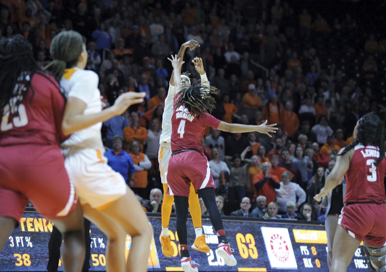 University of Tennessee's Rennia Davis (0) hits a three pointer over Cierra Johnson (4) with under a second left in the game to give the Lady Vols the 65-63 win over Alabama in an NCAA Women's Basketball game played in Knoxville, Tenn., Monday January 20, 2020. (Scott Keller/The Daily Times via AP)