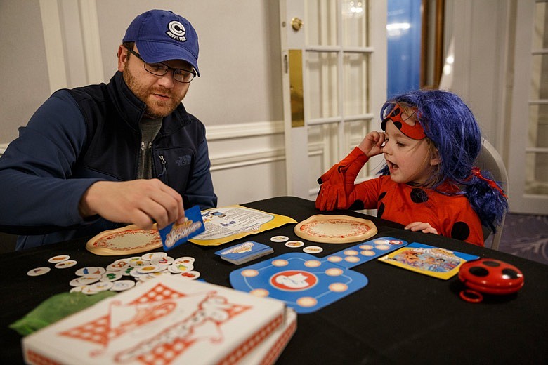 Mark Norwood plays the game Noodleboro with Makinley Norwood during Chattacon at the Read House hotel on Saturday, Jan. 26, 2019, in Chattanooga, Tenn. / Staff file photo