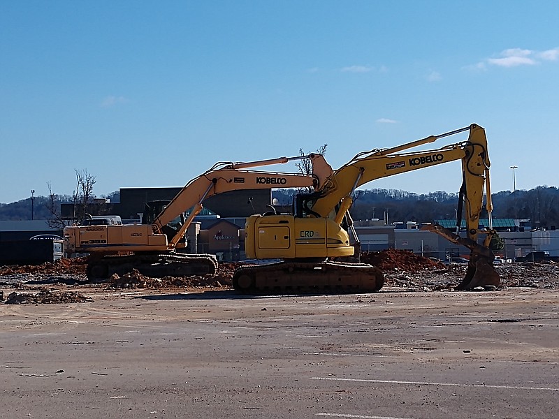 Staff photo by Mike Pare / Heavy construction equipment sits at the site of a planned new commercial complex near Northgate Mall that will hold new restaurants.