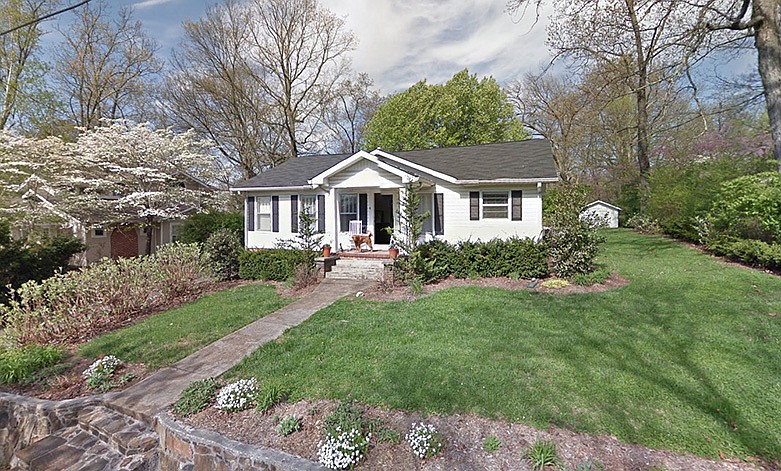 This screenshot of a Google Street View image shows the home on the 400 block of South Street in Signal Mountain that was the scene of a party that Signal Mountain police were called to Friday evening after a complaint of a fight. Police said about 30 people were found in the home, including at least one confirmed gang member. Police confiscated several stolen guns, marijuana and a stolen car at the party. / Image via Google Maps