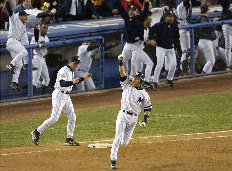AP File Photo/Bill Kostroun / On Oct. 31, 2001, the New York Yankees' Derek Jeter celebrates his winning home run in the 10th inning as he rounds first base in Game 4 of the World Series against Arizona at Yankee Stadium. Jeter missed by one vote being a unanimous pick for the 2020 Baseball Hall of Fame class.