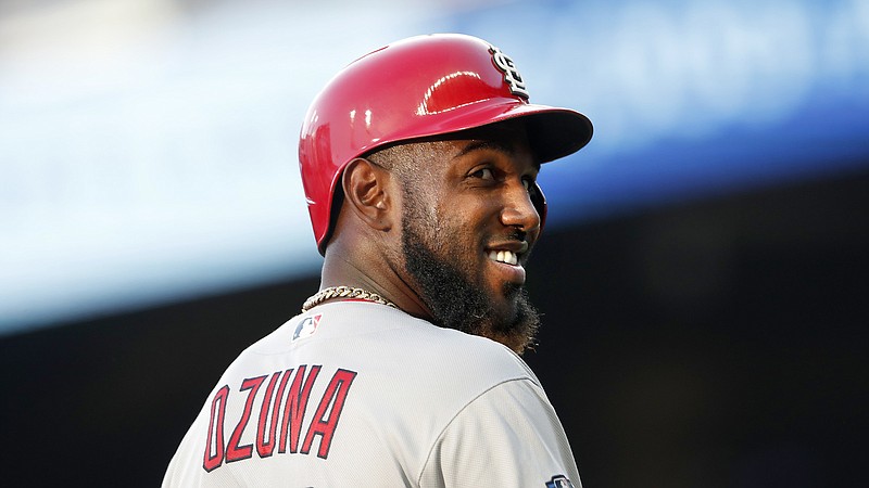 Marcell Ozuna stands on the field during the third inning of the St. Louis Cardinals' win against the host Atlanta Braves in the deciding Game 5 of their NL Division Series on Oct. 9. After playing for the Cardinals the past two seasons, Ozuna, a power-hitting outfielder, signed with the Braves on Tuesday. / AP photo by John Bazemore