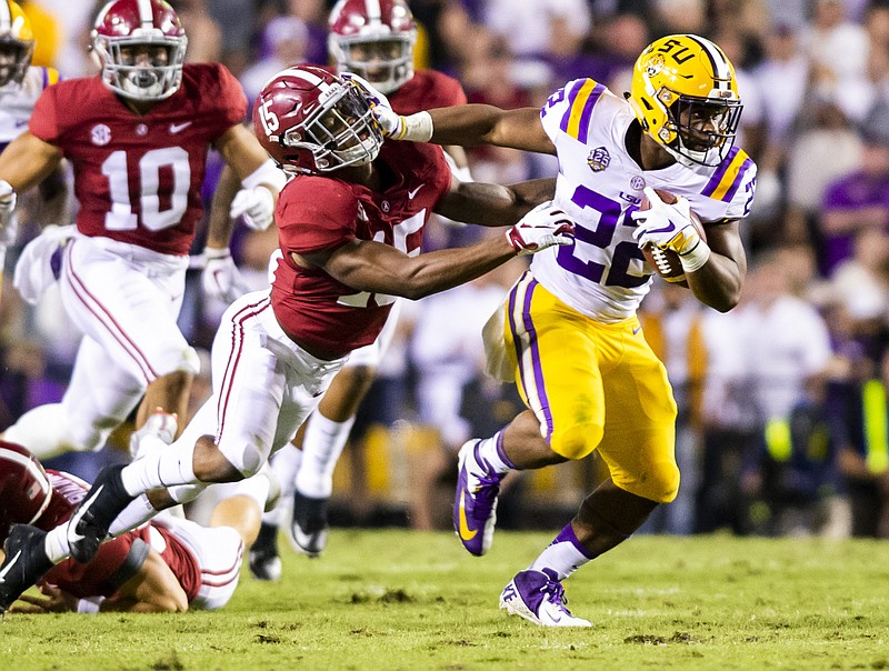 LSU photo / LSU running back Clyde Edwards-Helaire (22) and Alabama safety Xavier McKinney (15) are among the 36 SEC players who declared for the 2020 NFL draft with eligibility remaining.