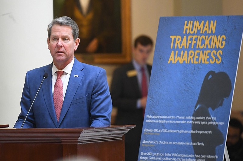 FILE - In this Monday, Jan. 13, 2020, file photo, Georgia Gov. Brian Kemp speaks on the rotunda about human trafficking during the opening day of the year for the general session of the state legislature in Atlanta. Georgia's Republican governor and first lady announced Tuesday, Jan. 21, 2020, a slate of legislative measures they want to see enacted in 2020 to combat human trafficking. (AP Photo/John Amis, File)


