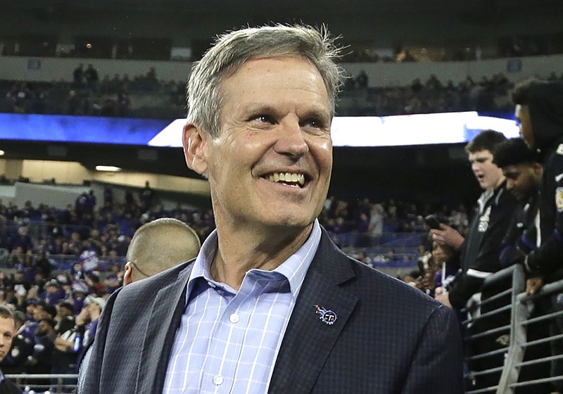 FILE - In this Jan. 11, 2020, file photo, Gov. Bill Lee, R-Tenn., walks on the turf before a NFL divisional playoff football game in Baltimore. (AP Photo/Julio Cortez, File)


