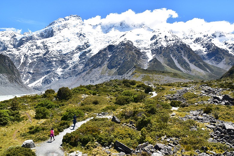 This Dec. 21, 2019, photo shows the Hooker Valley Track that leads to the base of the Hooker Glacier at the bottom of Mt. Cook, New Zealand’s tallest mountain, also known as “Cloud Piercer."  (Malcolm Foster via AP)