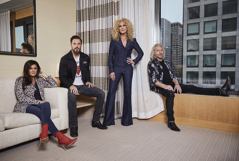This Jan. 13, 2020, photo shows members of the country group Little Big Town, from left, Karen Fairchild, Jimi Westbrook, Kimberly Schlapman and Phillip Sweet posing for a portrait in New York to promote their new album "Nightfall," out on Friday. (Photo by Matt Licari/Invision/AP)
