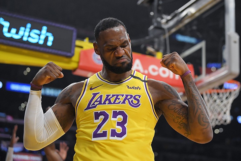 Los Angeles Lakers forward LeBron James celebrates after scoring and drawing a foul during the first half of a home game against the New York Knicks on Jan. 7. / AP photo by Mark J. Terrill