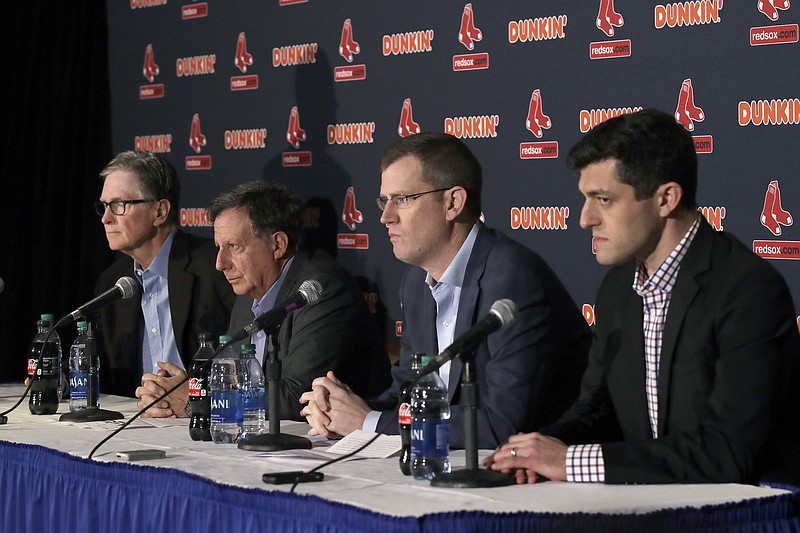 From left, Boston Red Sox owner John Henry, team chairman Tom Werner, CEO Sam Kennedy and chief baseball officer Chaim Bloom listen during a news conference Jan. 15 at Fenway Park. / AP photo by Elise Amendola