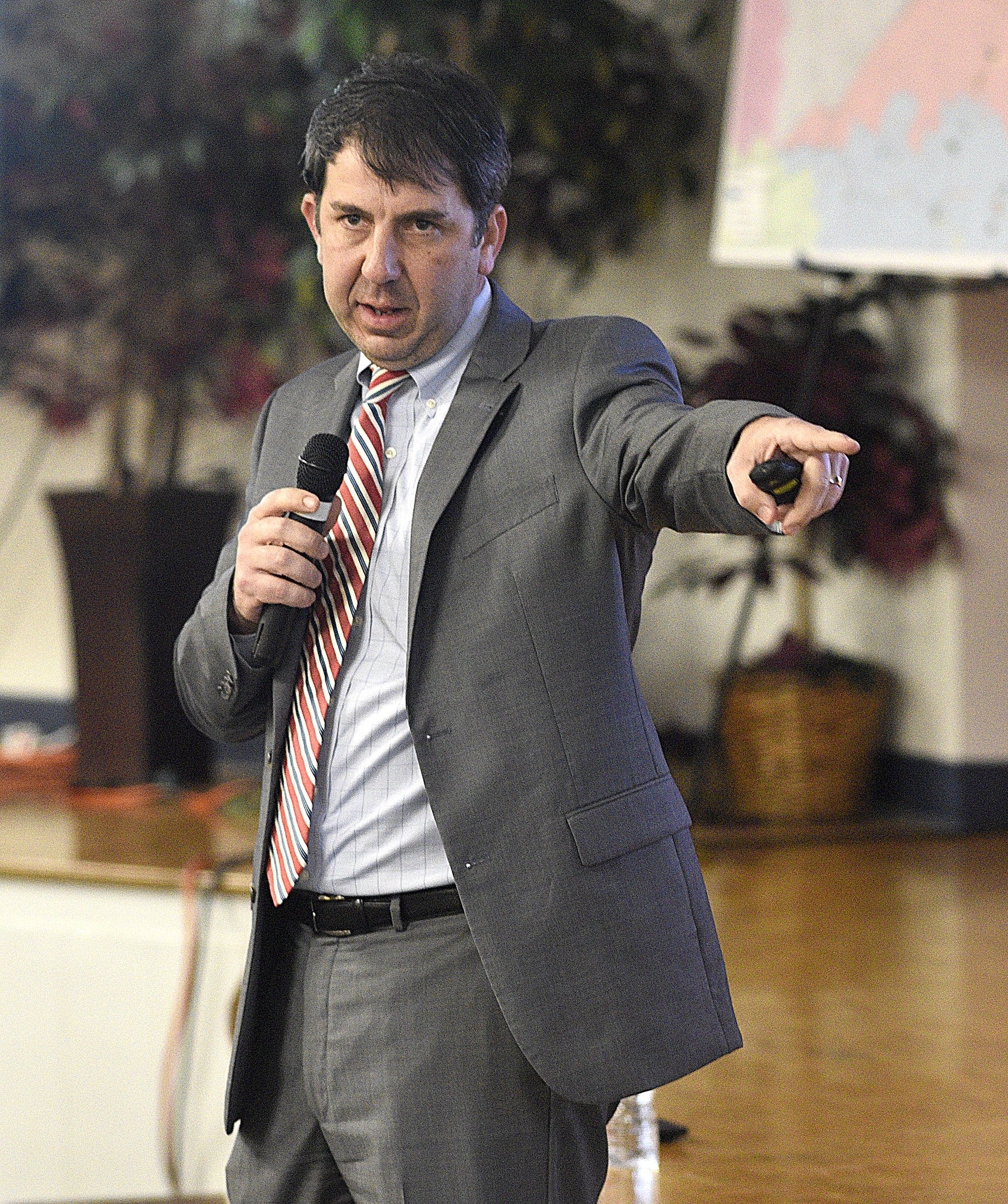 Staff Photo by Robin Rudd/ Chief Schools Officers Dr. Justin Robertson answers a question. The conversation about rezoning some of Hamilton County Schoolsՠattendance zones began with a meeting to discuss the East Hamilton/Ooltewah rezoning at Ooltewah Middle School Tuesday night. This is the first of three such meetings.