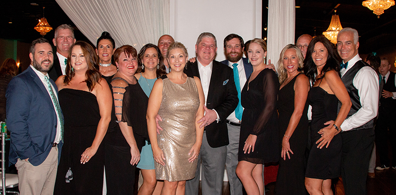 Trevor Connell, Robert Smith, Claire Connell, Andy Smith, Stacey Scoggins, Ashley & Eric Barnes (in back), Mary Miles & Harris Davis, Richard & Holly Bradford, Bridget & Barry Frizzell (in back), Mary Batter and Kevin Lusk / Photo by Angela Dillard