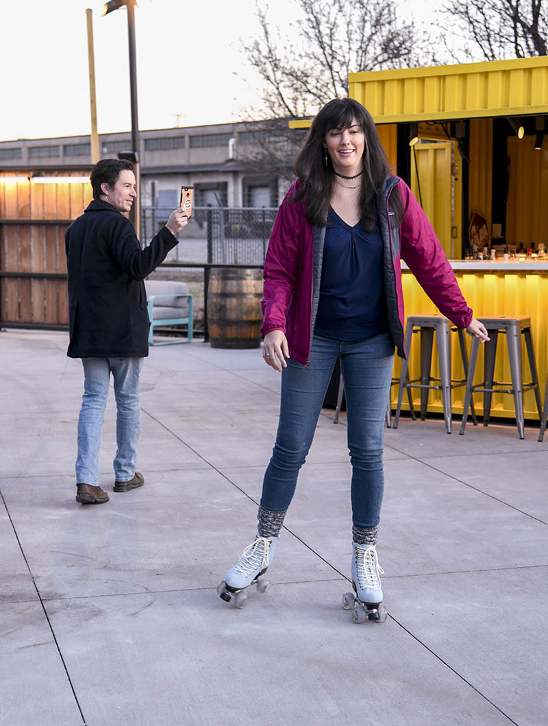 Tess Henshaw roller skates on the patio at the Moxy Hotel./ Photography by Mark Gilliland