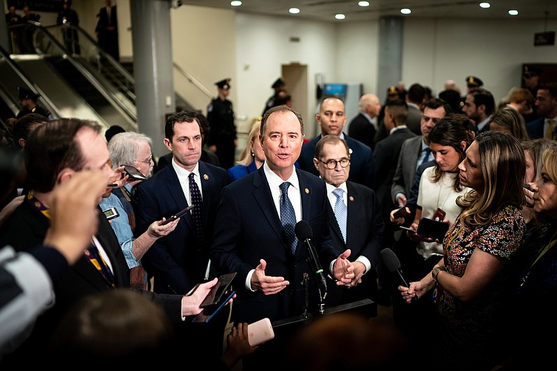 Rep. Adam Schiff , D-California, joined by the other House impeachment managers, talks to reporters before the start of the Senate impeachment trial of President Donald Trump on Wednesday. / Photo by Erin Schaff, The New York Times