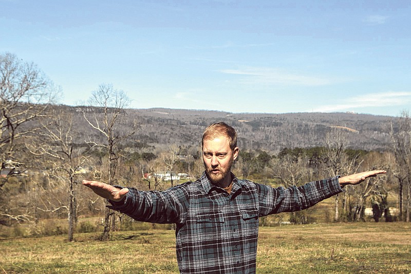 Staff file photo by C.B. Schmelter / Bryan Johnson talks while giving a tour of his property in Flintstone in March 2019. Johnson planned to establish a high-end camping business on the 16-acre site, but has not been able to open the business due to Walker County zoning issues.