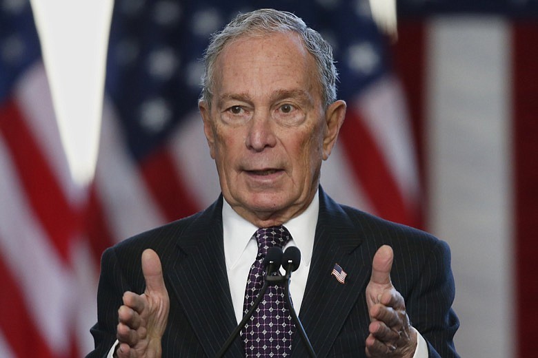 In this Jan. 19, 2020, file photo, Democratic presidential candidate Michael Bloomberg speaks at the Greenwood Cultural Center in Tulsa, Okla. They are circling each other like wary boxers, with taunts on Twitter, snarky asides and belittling depictions of one another. They rose to prominence in Manhattan on parallel tracks, amassed wealth real and perceived and displayed a penchant for putting their names on things. President Donald Trump and Mike Bloomberg could hardly be more different as people but now they both want the same job: Trump's. (AP Photo/Sue Ogrocki, File)