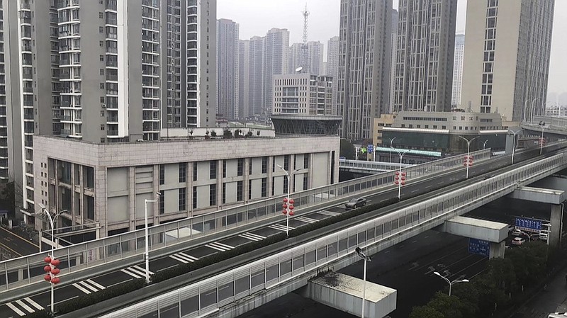 In this photo provided by Chen Yanxi, a nearly-deserted expressway is seen in Wuhan in central China's Hubei Province, Friday, Jan. 24, 2020. China's attempt to stop a deadly virus by cutting off access to cities with 25 million inhabitants is a step few other governments would consider but is made possible by the ruling Communist Party's extensive social controls and experience fighting the 2002-03 outbreak of SARS. (Chen Yanxi via AP)



