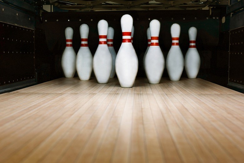Ten pin bowling alley background. / Getty Images/iStockphoto/Prostock-Studio
