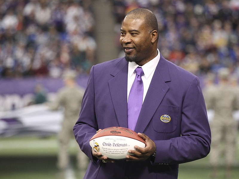 Former Minnesota Vikings defensive end Chris Doleman acknowledges the crowd during a ceremony honoring the All Mall of America Field team during halftime of a game against the Philadelphia Eagles on Dec. 15, 2013, in Minneapolis. He had 150.5 sacks during an NFL career that lasted 15 seasons, most of them with the Vikings. / AP photo by Andy King