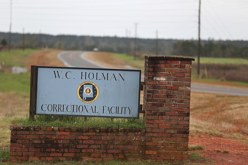 FILE -In this March 12, 2016 file photo, the sign to The William C. Holman Correctional Facility in Atmore, Ala., is displayed. (Sharon Steinmann/AL.com via AP, File)


