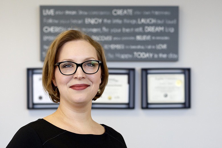 Staff photo by C.B. Schmelter / Owner Carrie Turcotte poses in her office at Northshore Financial Strategies on Monday, Dec. 30, 2019, in Chattanooga, Tenn.