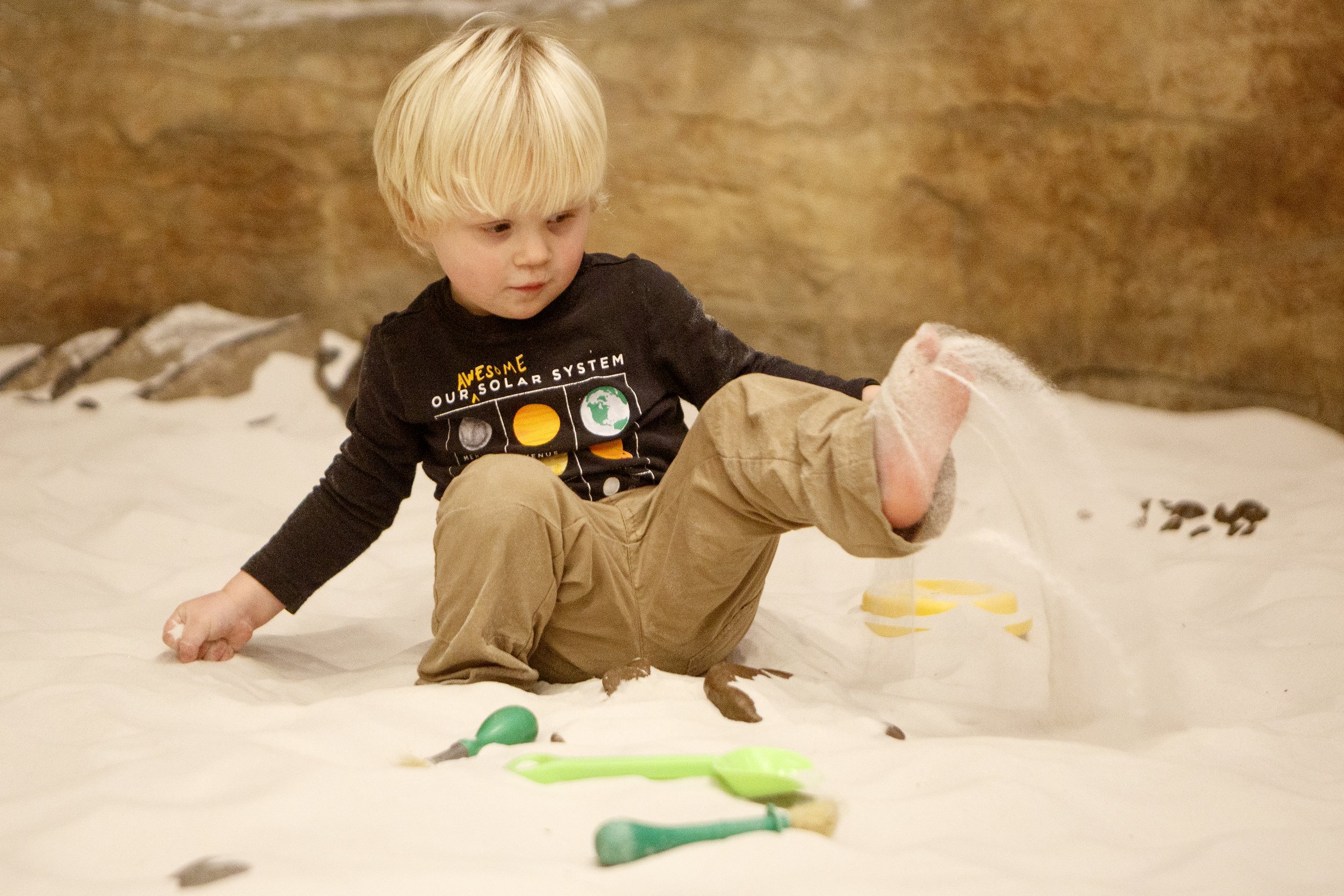 Staff photo by C.B. Schmelter / Grayson Pridgen, 2, plays at the Excavation Station exhibit at the Creative Discovery Museum on Wednesday, Jan. 29, 2020 in Chattanooga, Tenn.