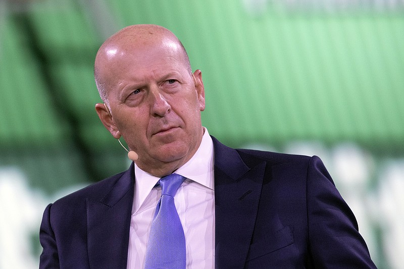 File photo by Mark Lennihan of The Associated Press / In this September 2019 photo David Solomon, chairman and CEO of Goldman Sachs, speaks at the Bloomberg Global Business Forum in New York.