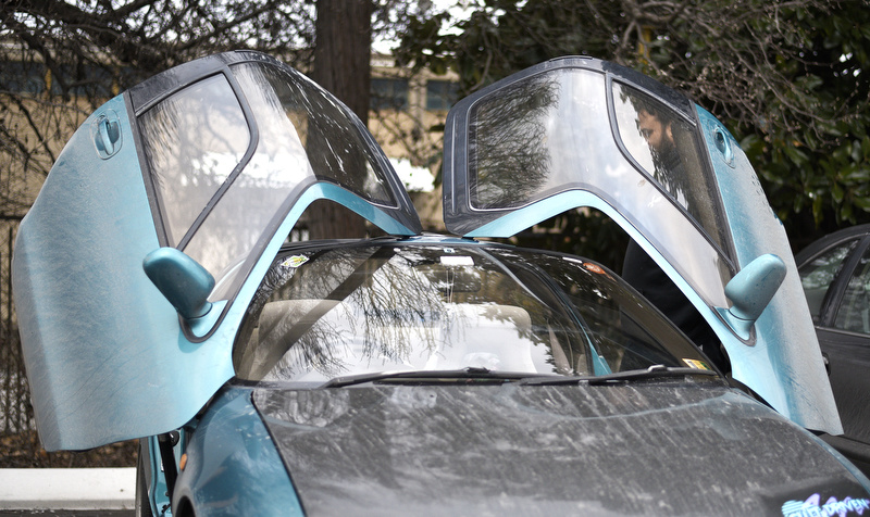 Staff Photo by Robin Rudd/ A Toyota Sera concept car was noted for its mostly glass roof canopy and its butterfly doors. For a fourth year, the Lemons Rally rolled out of the Appalachian Mountains in a four-day road trip that pits drivers of dozens of dilapidated vehicles from across the country against the road, the winter weather and their ugly, rusty vehicles. Chattanooga was a stop on the route before the event continues on to its finish in Birmingham, Alabama.