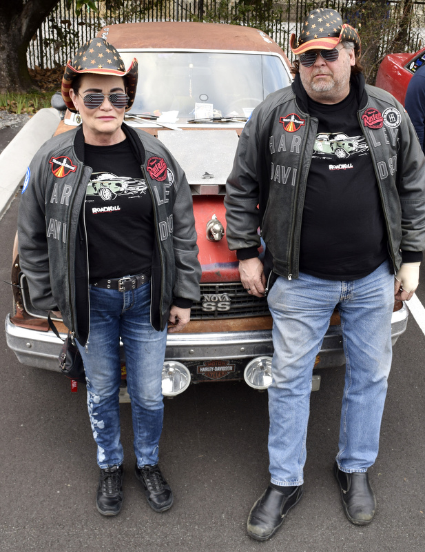 Staff Photo by Robin Rudd/ Debbie and Robert Williams pose inf front of their 1975 Nova SS, "Ole Rusty." For a fourth year, the Lemons Rally rolled out of the Appalachian Mountains in a four-day road trip that pits drivers of dozens of dilapidated vehicles from across the country against the road, the winter weather and their ugly, rusty vehicles. Chattanooga was a stop on the route before the event continues on to its finish in Birmingham, Alabama.