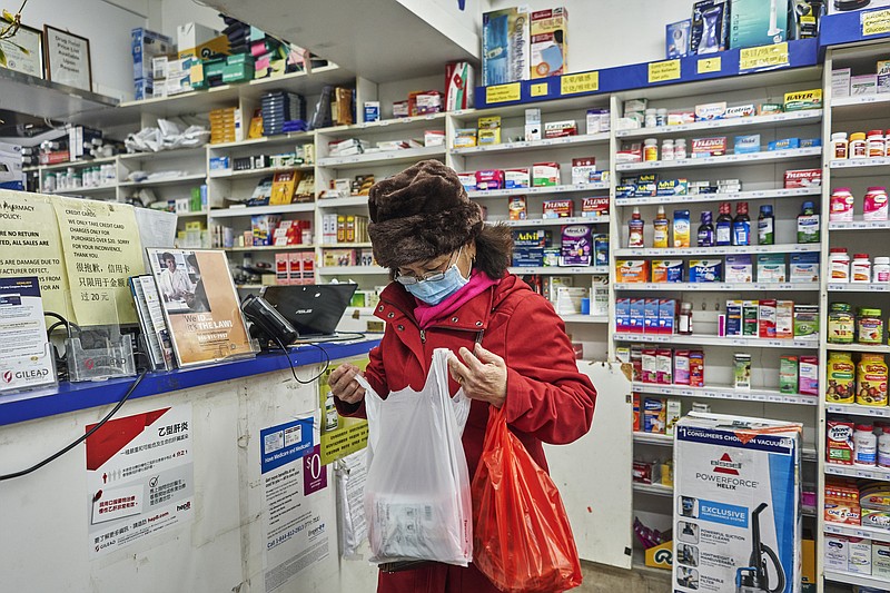 An Rong Xu,The New York Times/This woman in New York had already checked at multiple stores for masks before she was able to purchase five of them last week. For Americans with close ties to China, the coronavirus outbreak that started in the city of Wuhan and has spread to 17 countries has brought unexpected new worry, disappointment and scrutiny.